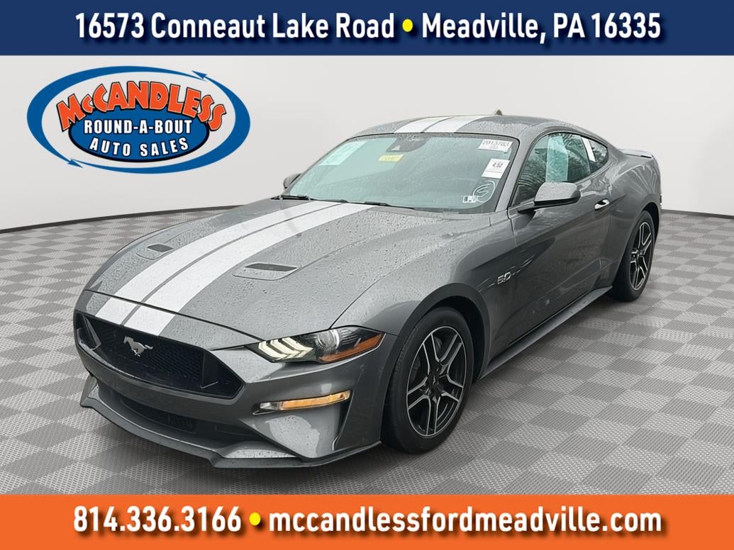 2021 Ford Mustang GT Premium in Carbonized Grey — front three-quarter view
