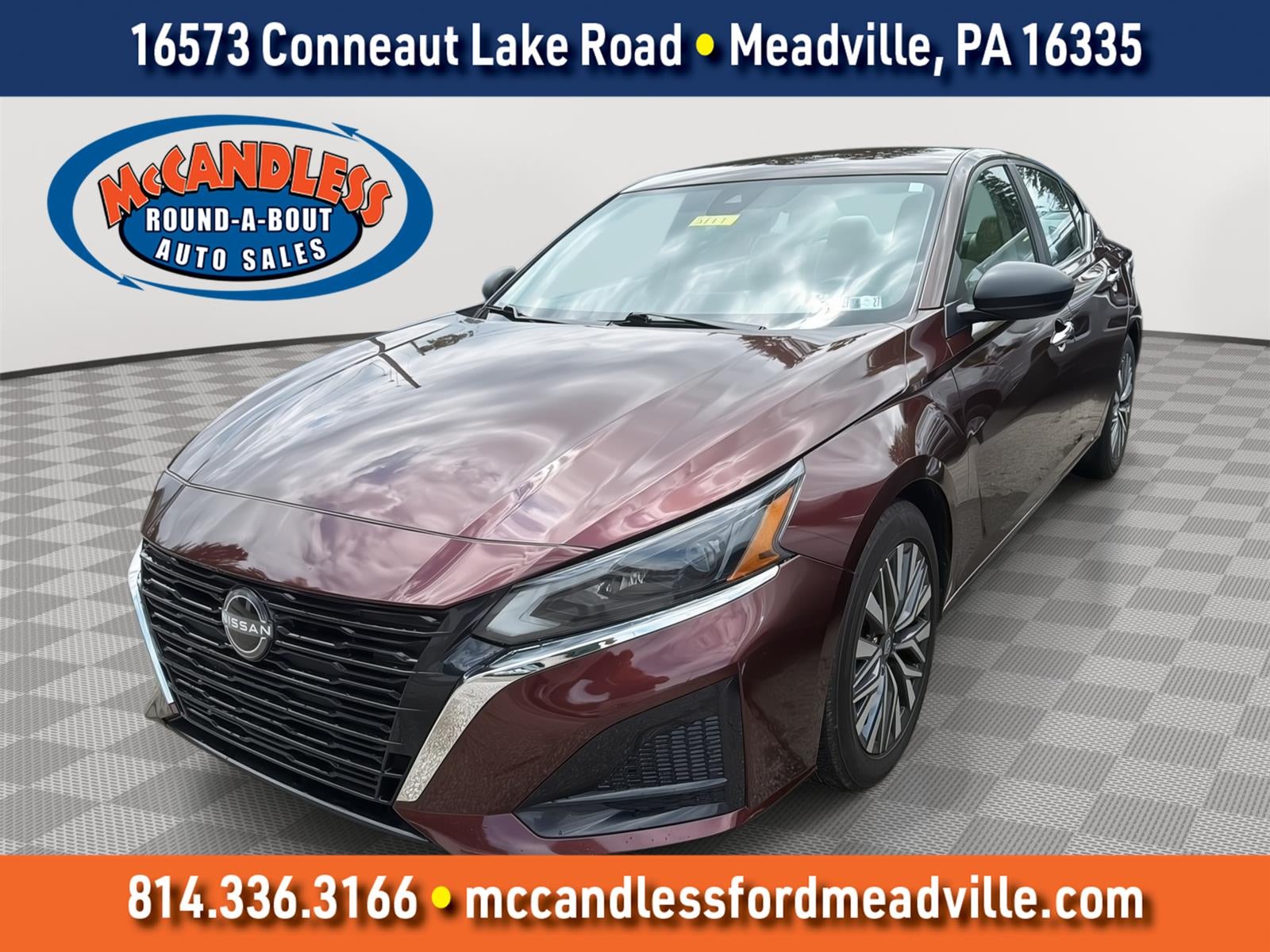 2024 Nissan Altima 2.5 SV in Garnet Pearl Metallic — front three-quarter view