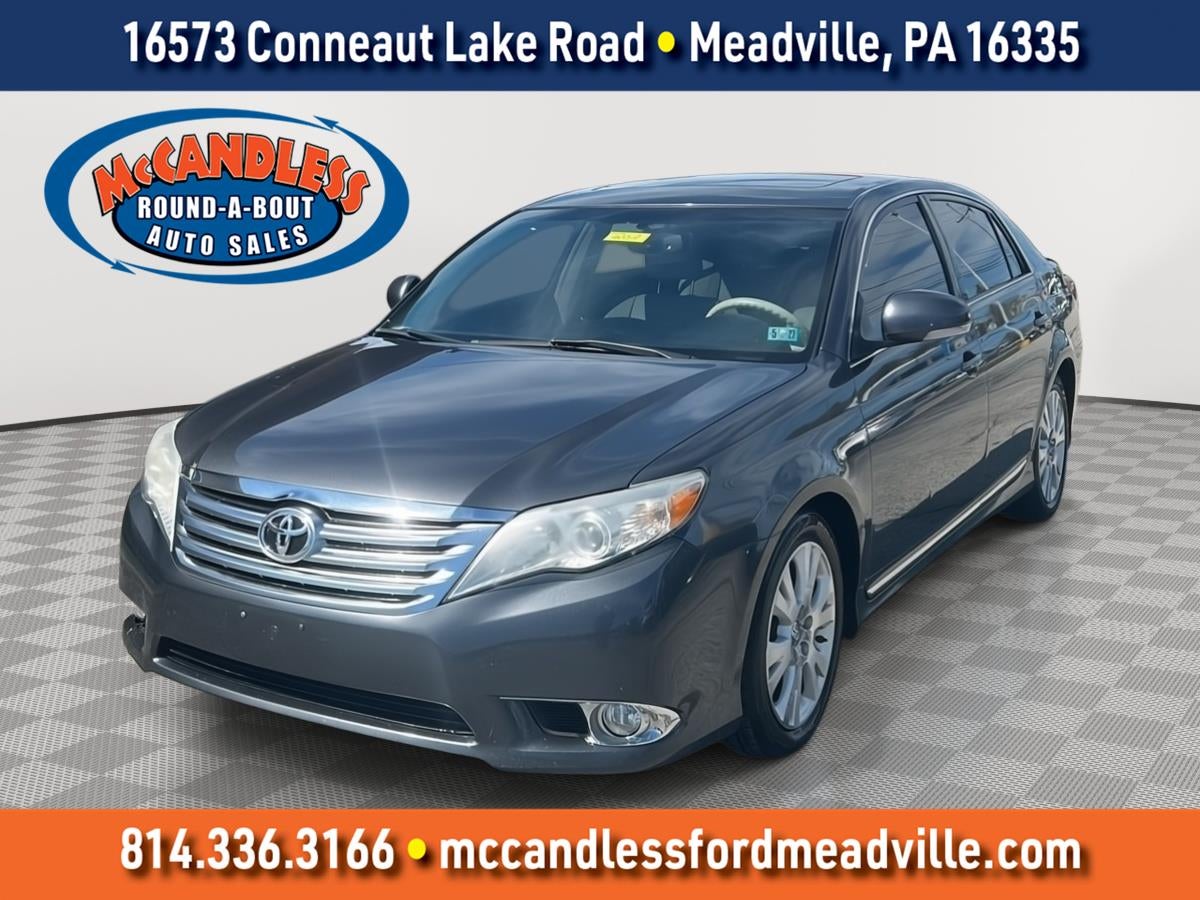 2012 Toyota Avalon Base in Magnetic Gray Metallic — front three-quarter view